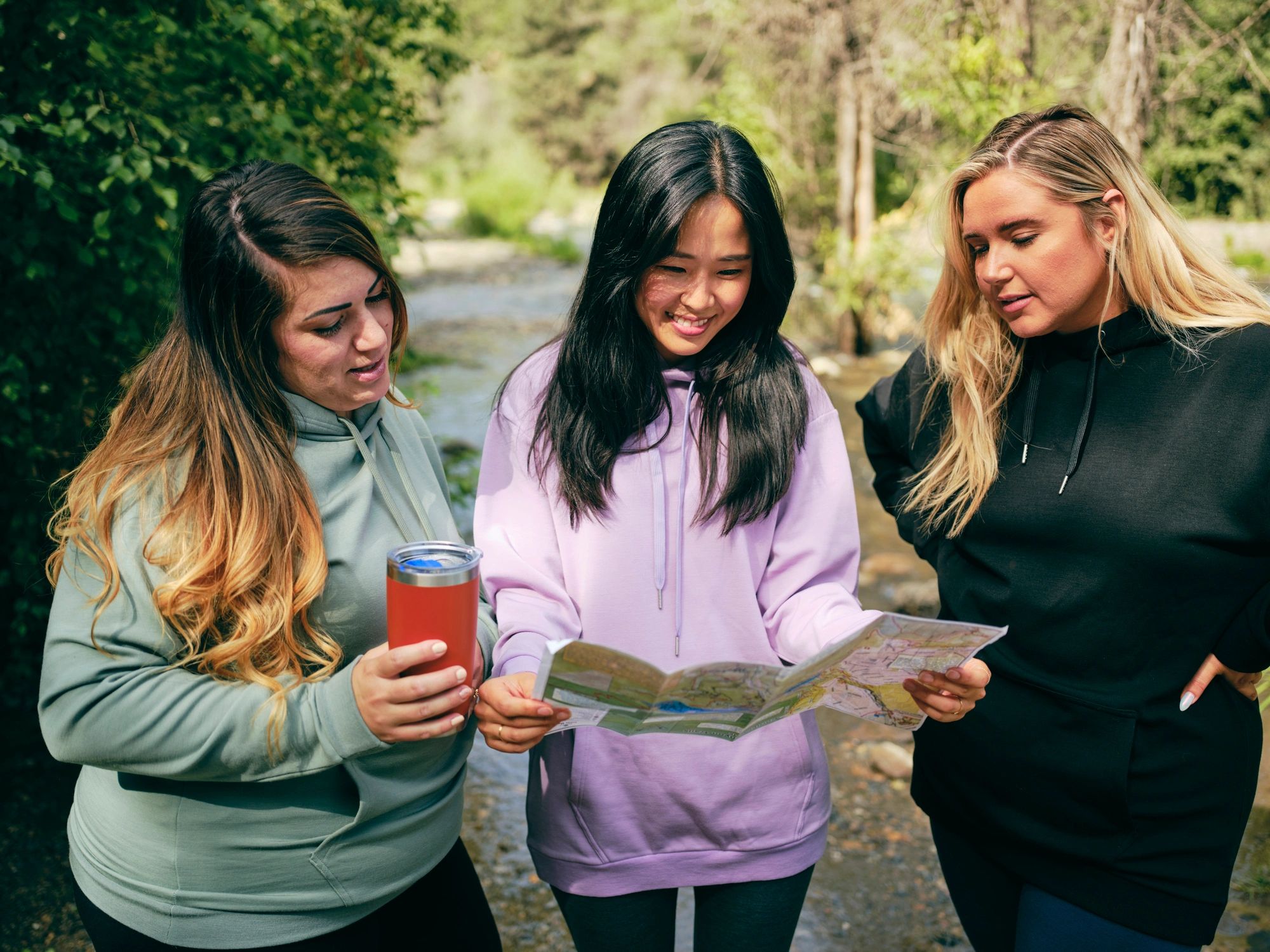 Outdoor team member hiking with friends
